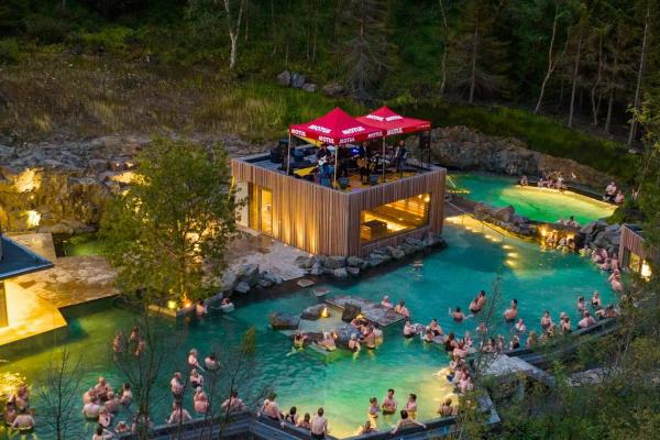 Forest Lagoon full of people at night