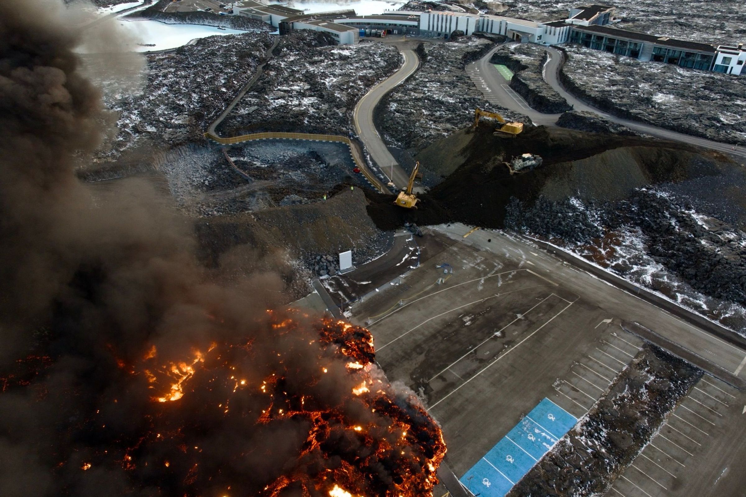 Lava advancing and destroying the Blue Lagoon's parking