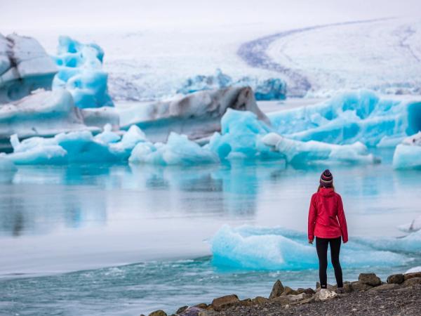 Girl admiring Jökulsárlón Glacier Lagoon