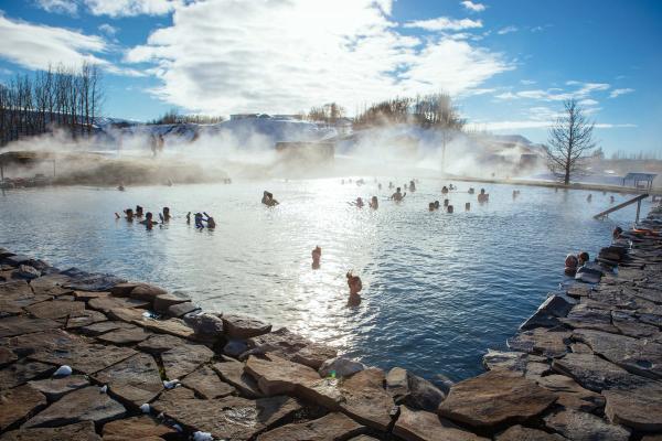 People inside the Secret Lagoon in Iceland