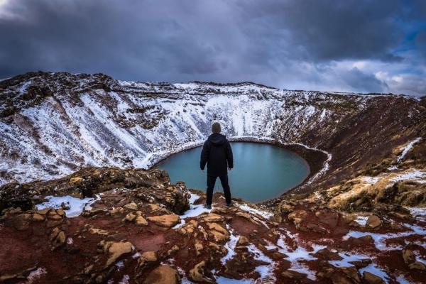 Man in front of Kerid Crater, Iceland