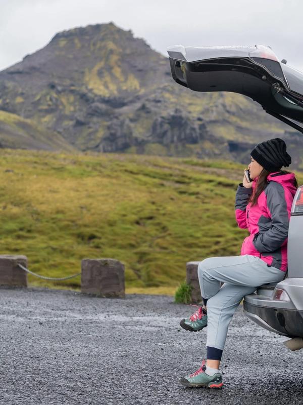 Car Rental in Iceland Car rental in Iceland with a person and a picturesque landscape in the background
