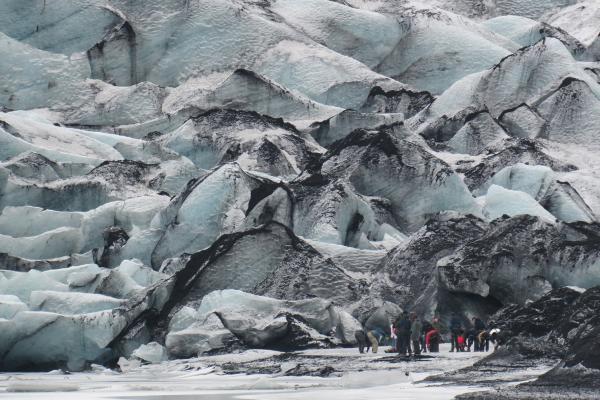 People getting ready to hike Solheimajökull Glacier
