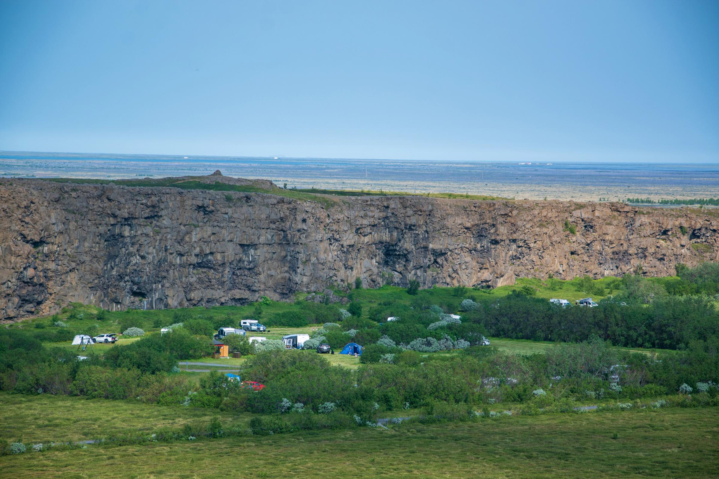 Campsite at the base of a cliff