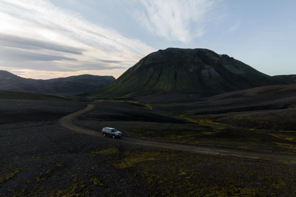 Toyota Land Cruiser on F-road in iceland A robust Toyota Land Cruiser navigating the off-roads in Iceland's rugged terrain