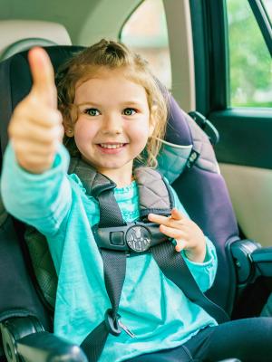 Children in a car seat  Children in a booster car seat