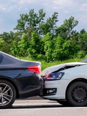 A car collision Road traffic accident. Two passenger cars collided on the road. Minor damage without injured people