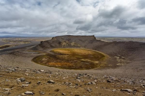 a wide crater on a open volcanic field