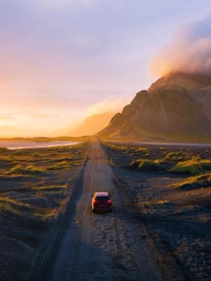 Car driving through an spectacular landscape in Iceland