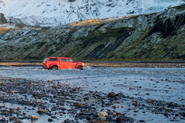F207 – Lakagigavegur F-road in south Iceland Car crossing river in south Iceland