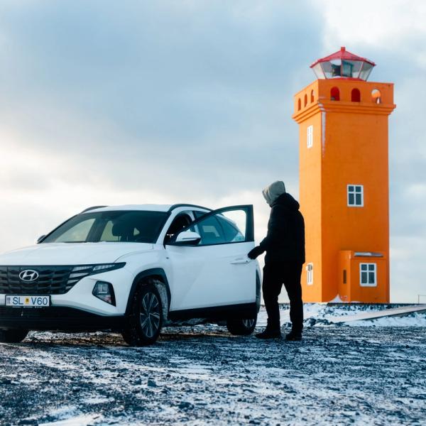 A car navigating snowed roads in Iceland