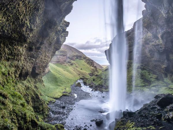 Kvernufoss Waterfall from behind