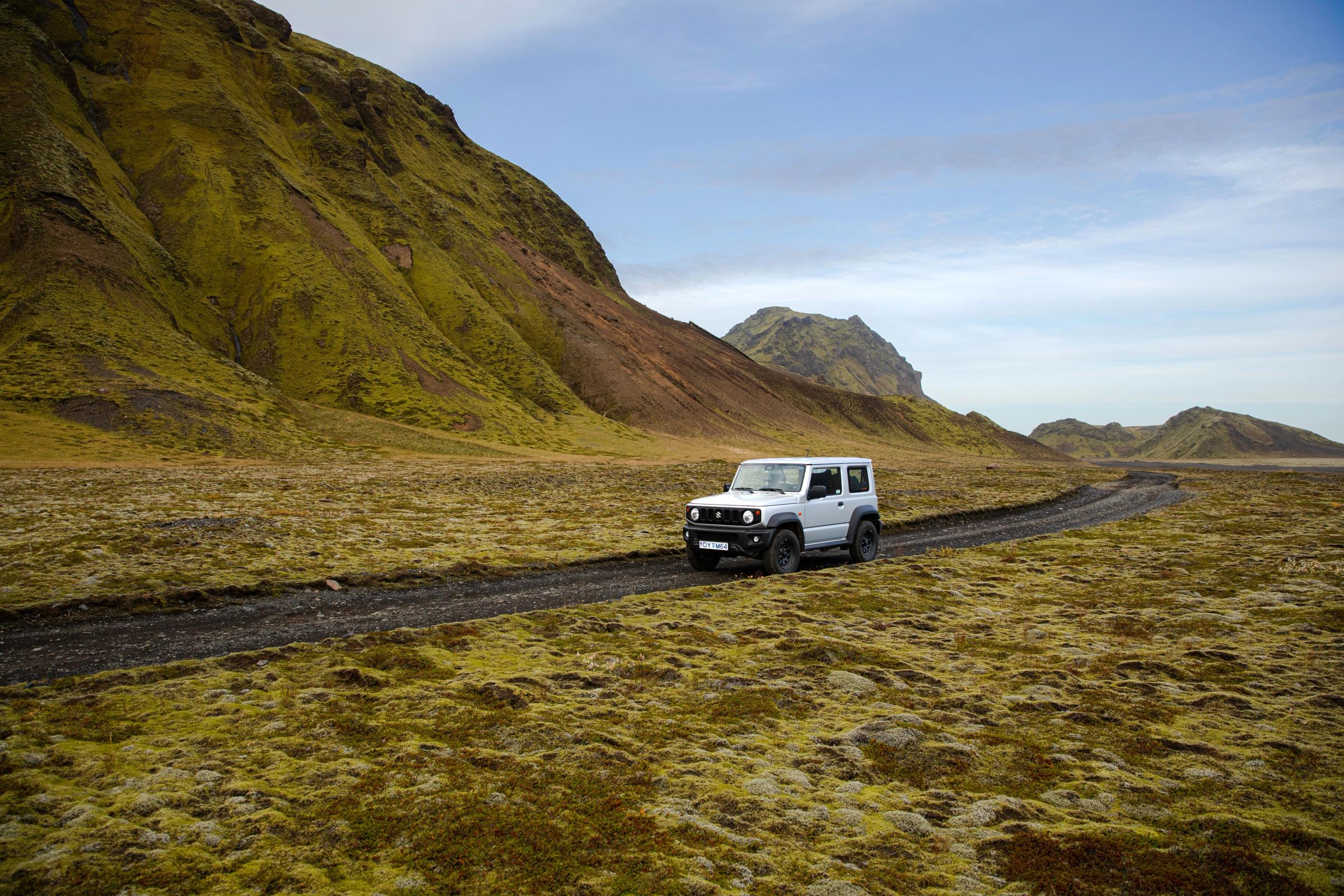 Suzuki Jimny rental car in green Iceland