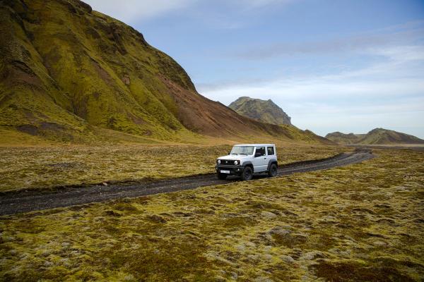 Suzuki Jimny rental car in green Iceland