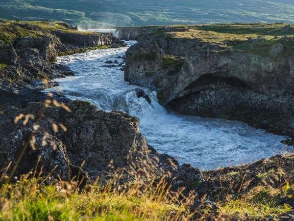 Geitafoss Waterfall surrounded by greenery