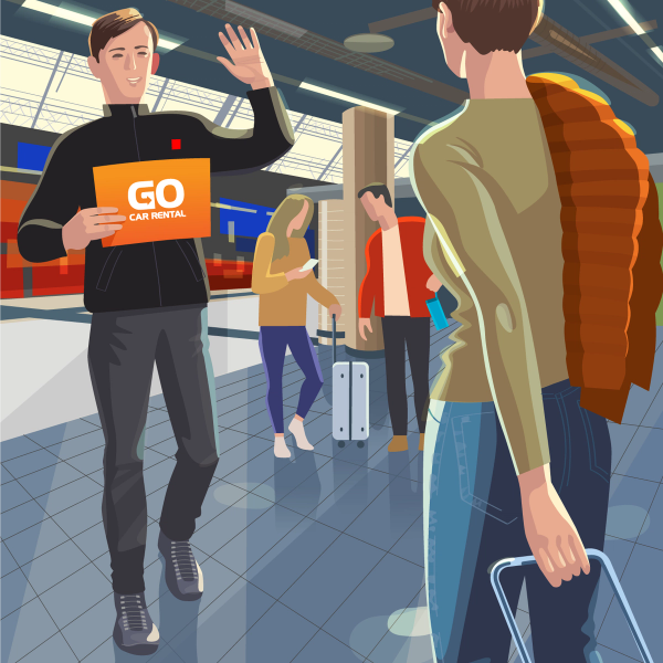 a man holding an orange sign that says go car rental