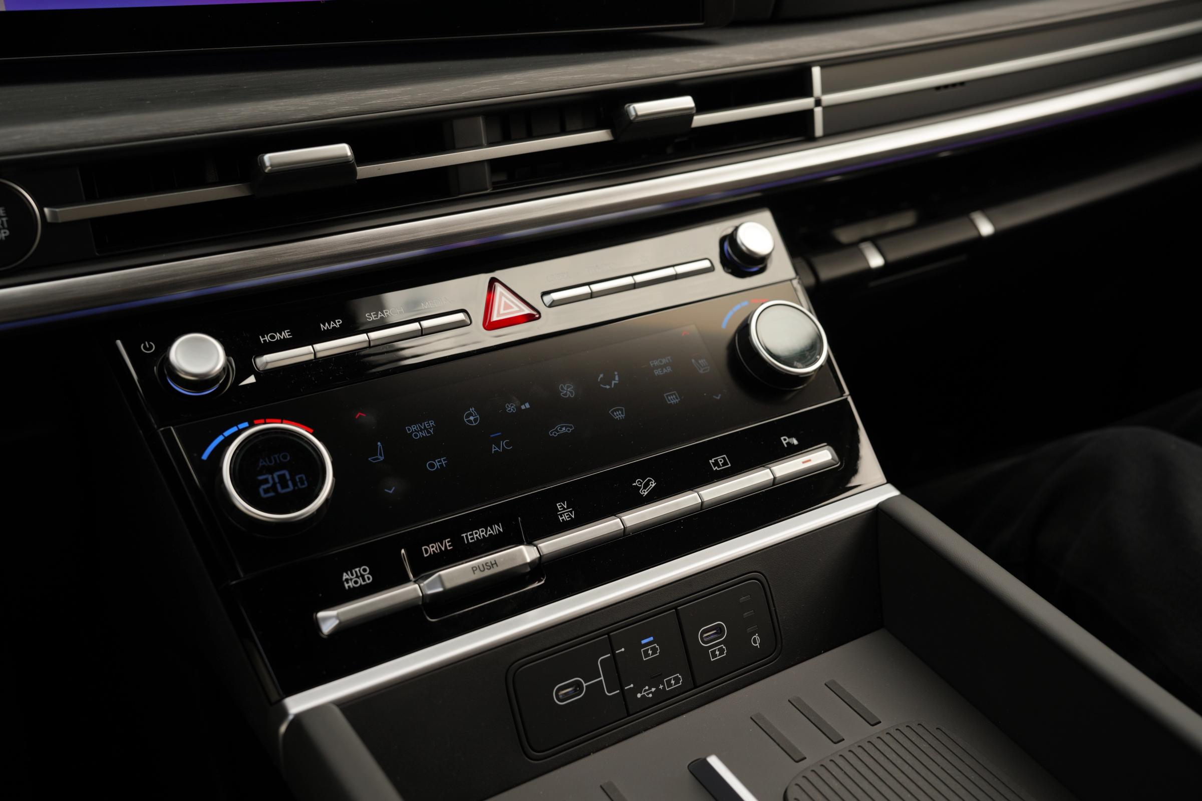 Hyundai Santa Fe centre console with climate controls, terrain mode selector and USB ports