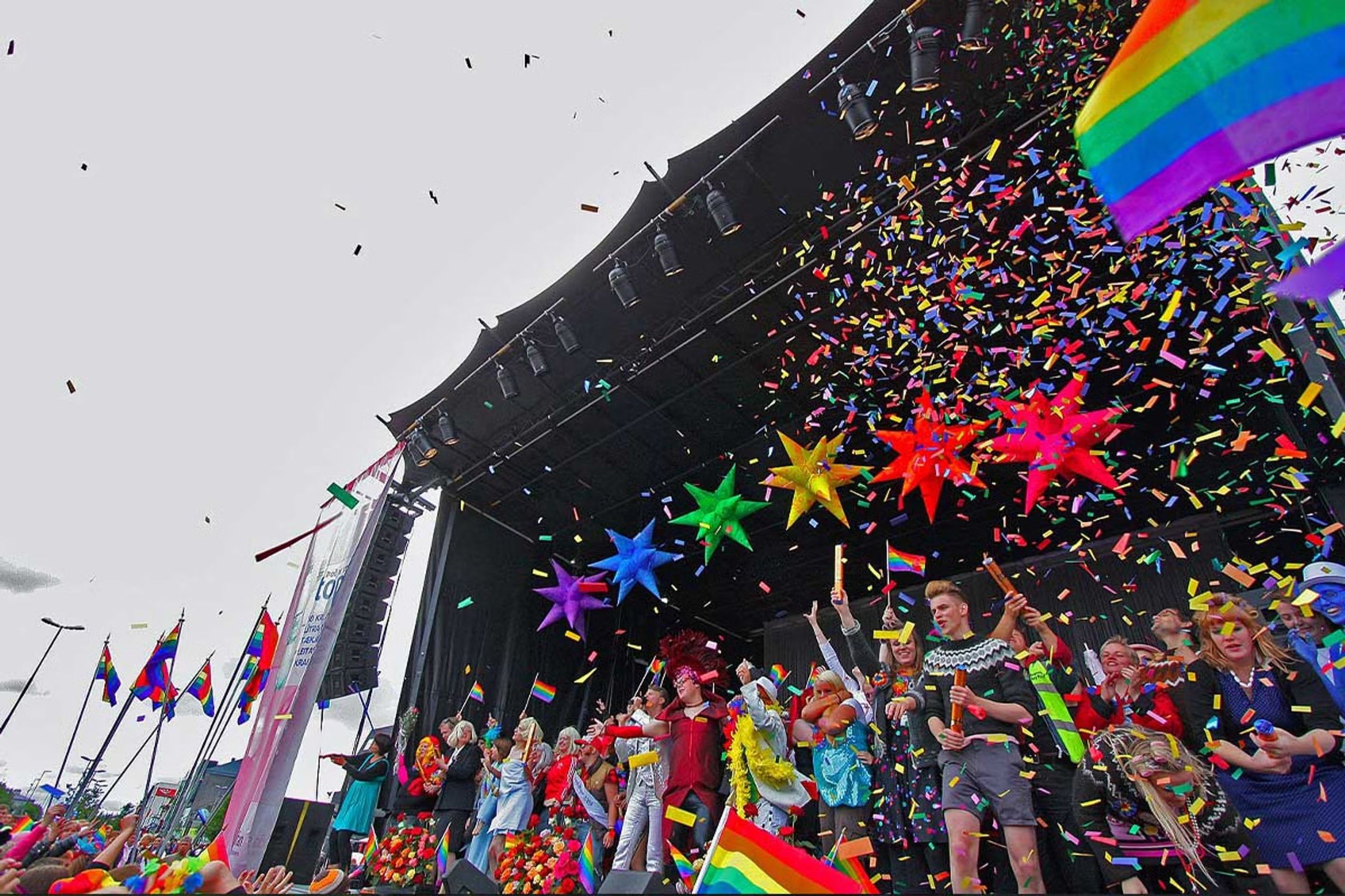 People on a stage celebrating the Reykjavik Gay Pride