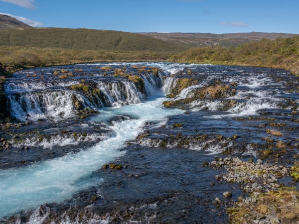 Brúarfoss waterfall on a sunny day