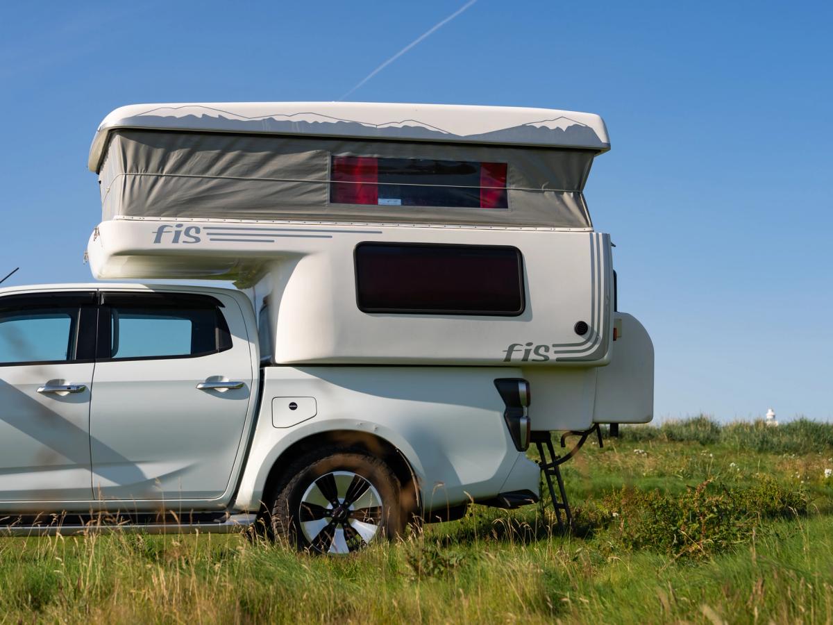 4x4 Camper Pop-Up Roof A 4x4 camper that sleeps 4 people with pop-up roof raised, camper van rental Iceland