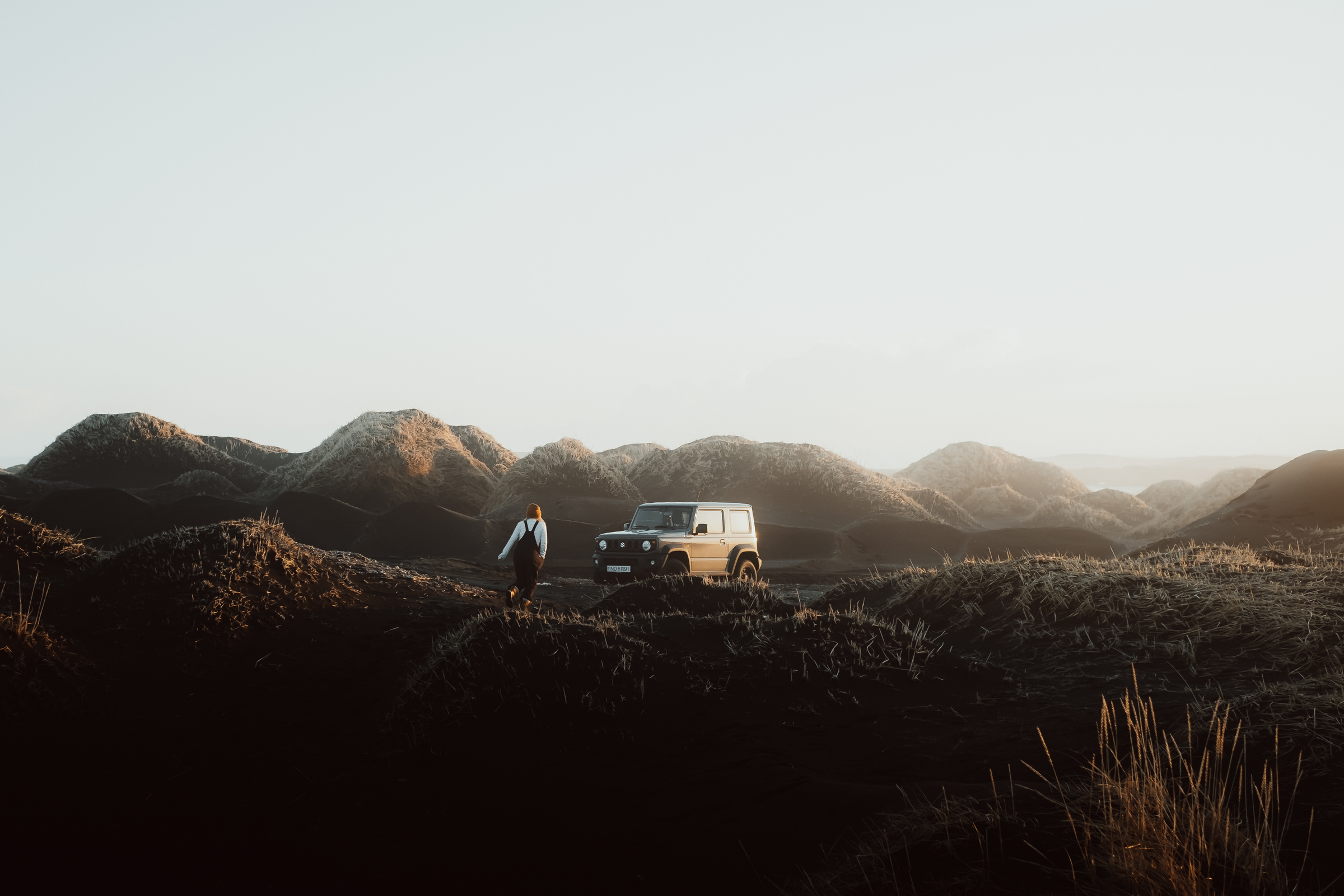 Girl with a 4x4 rental in Iceland