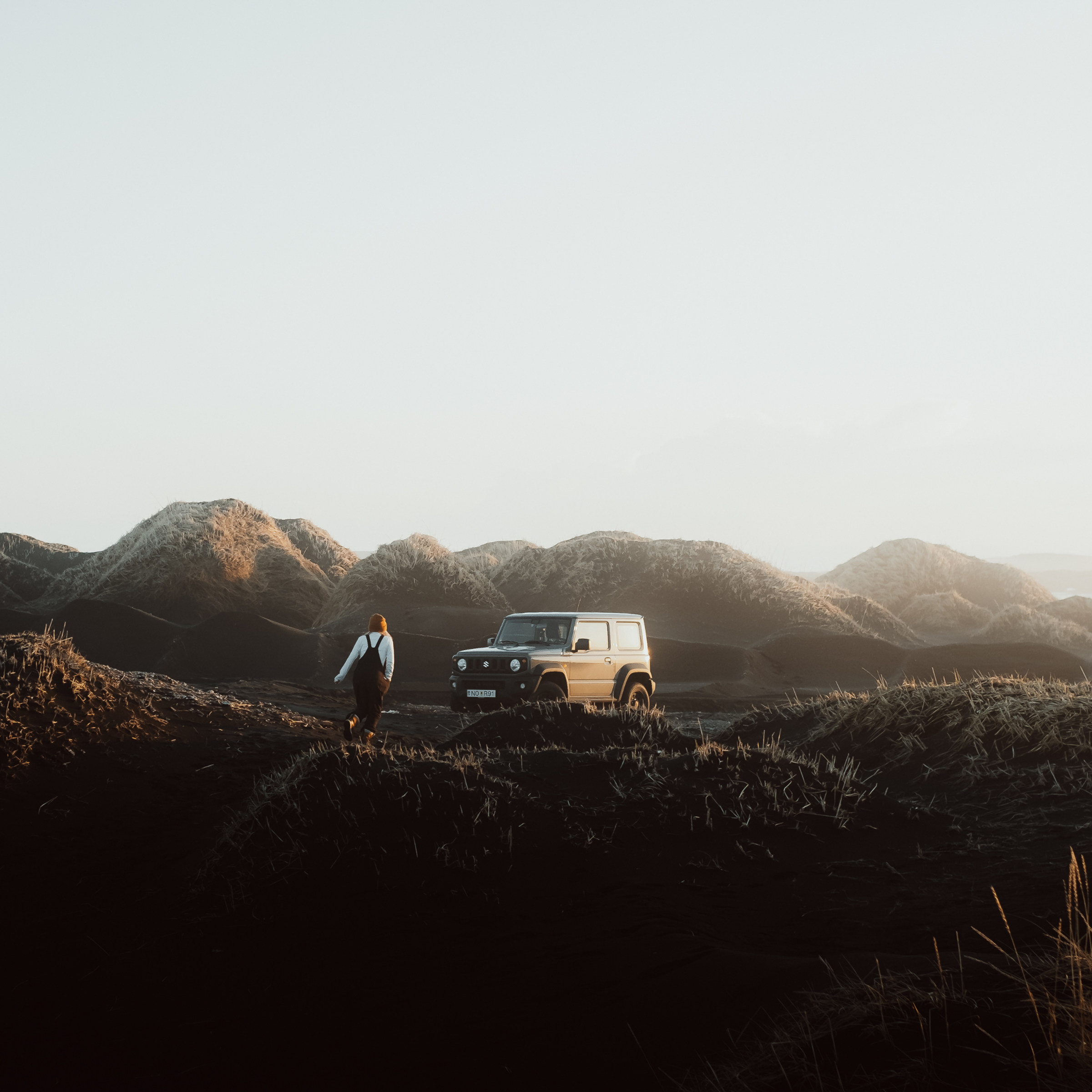 Girl with a 4x4 rental in Iceland
