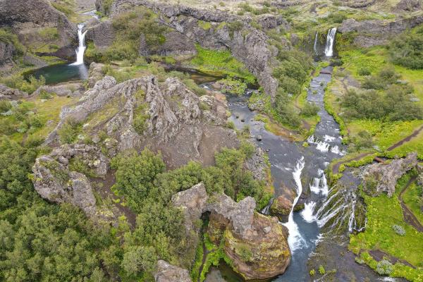 Drone view at the waterfalls of Gjain in Iceland