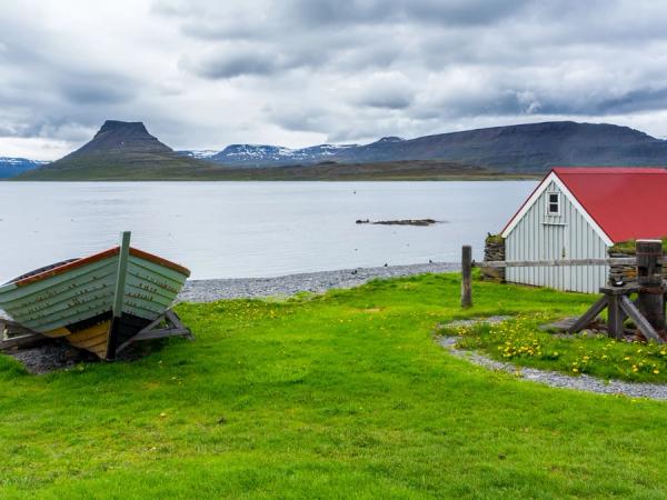 buildings and boats on the remote island of Vigur,