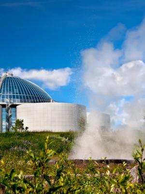 a dome shaped building with steam coming out of it .