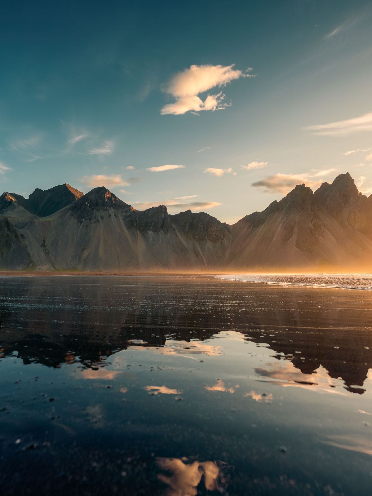 Black Sand Beach in Iceland Sunrise over Vestrahorn mountain at Stokksnes Black Sand Beach in Iceland