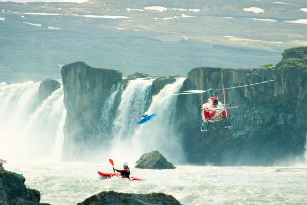 FlyOver Iceland Behind the Scenes Kayaking scene with helicopter during a flyover iceland movie making