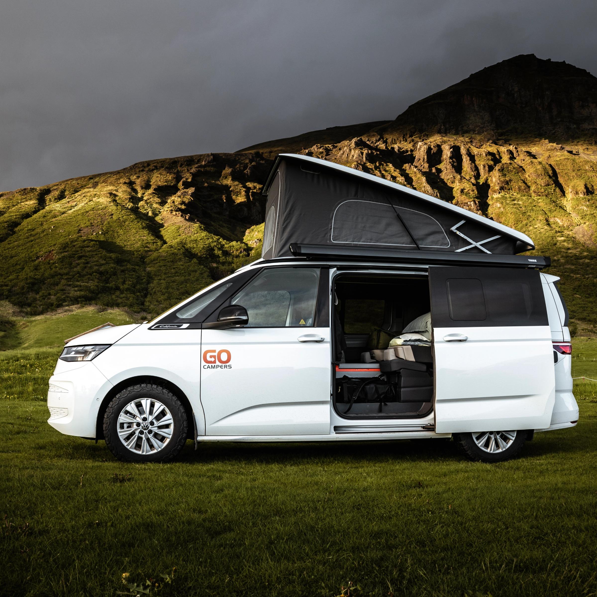 White campervan with the passanger's door open