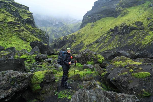 Hiker walking Hiker walking on a trail in Iceland's glacial river canyons