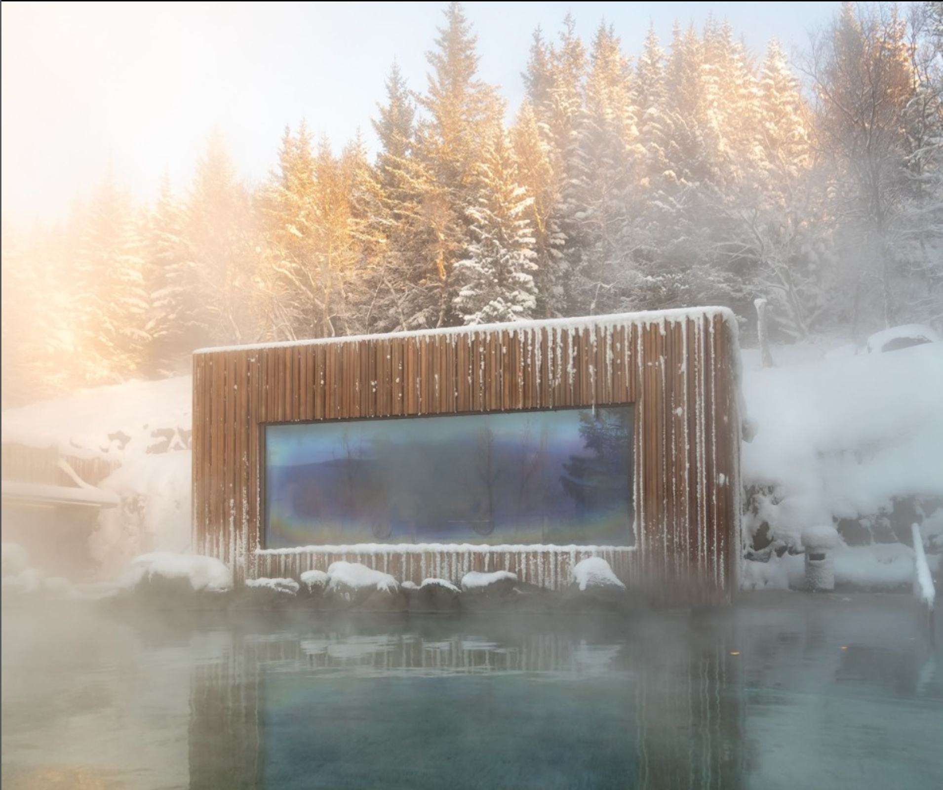 un edificio de madera en medio de un bosque nevado