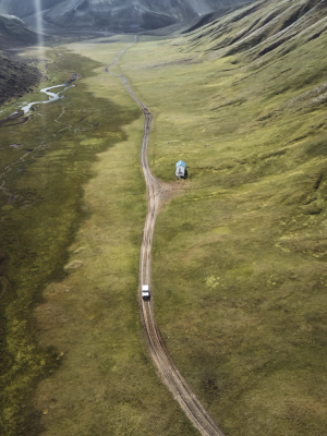 Rental Car Rental Car from Go Car Rental driving on a gravel road in Iceland
