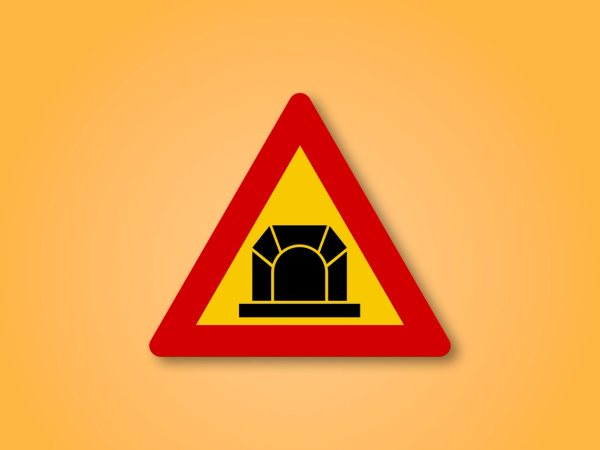 a yellow and red triangle sign with a bridge on it