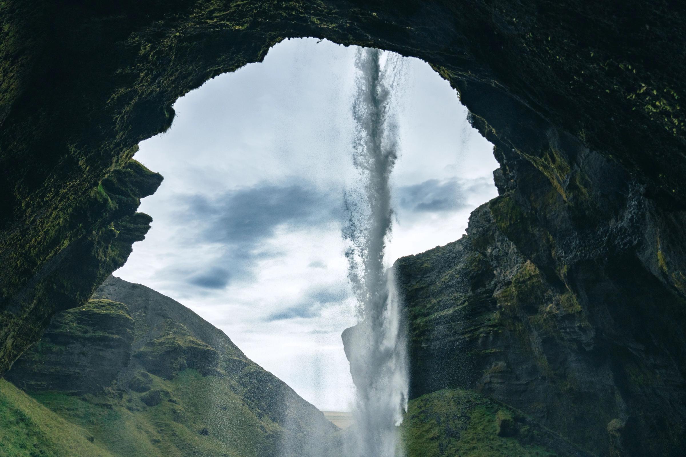 Kvernufoss Waterfall from behind