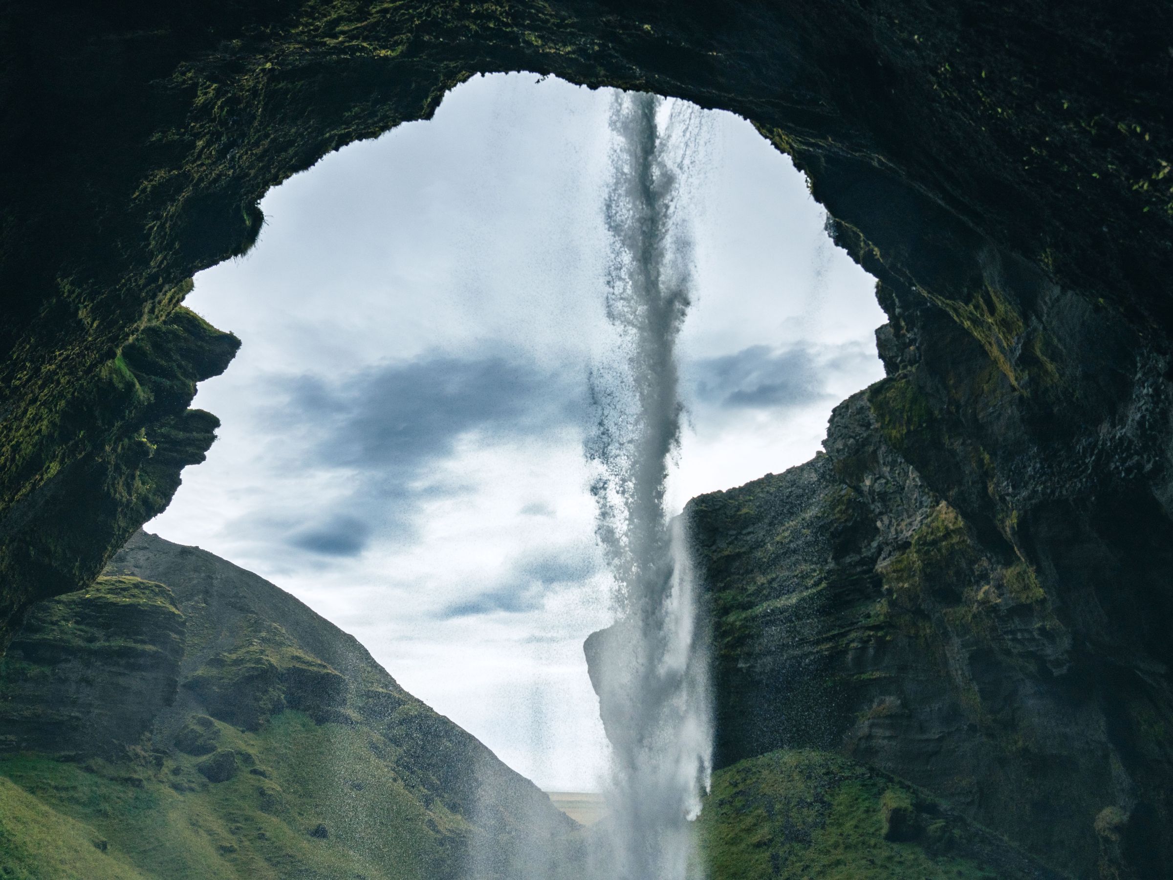 Kvernufoss Waterfall from behind