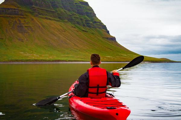 A man kayaking in Iceland