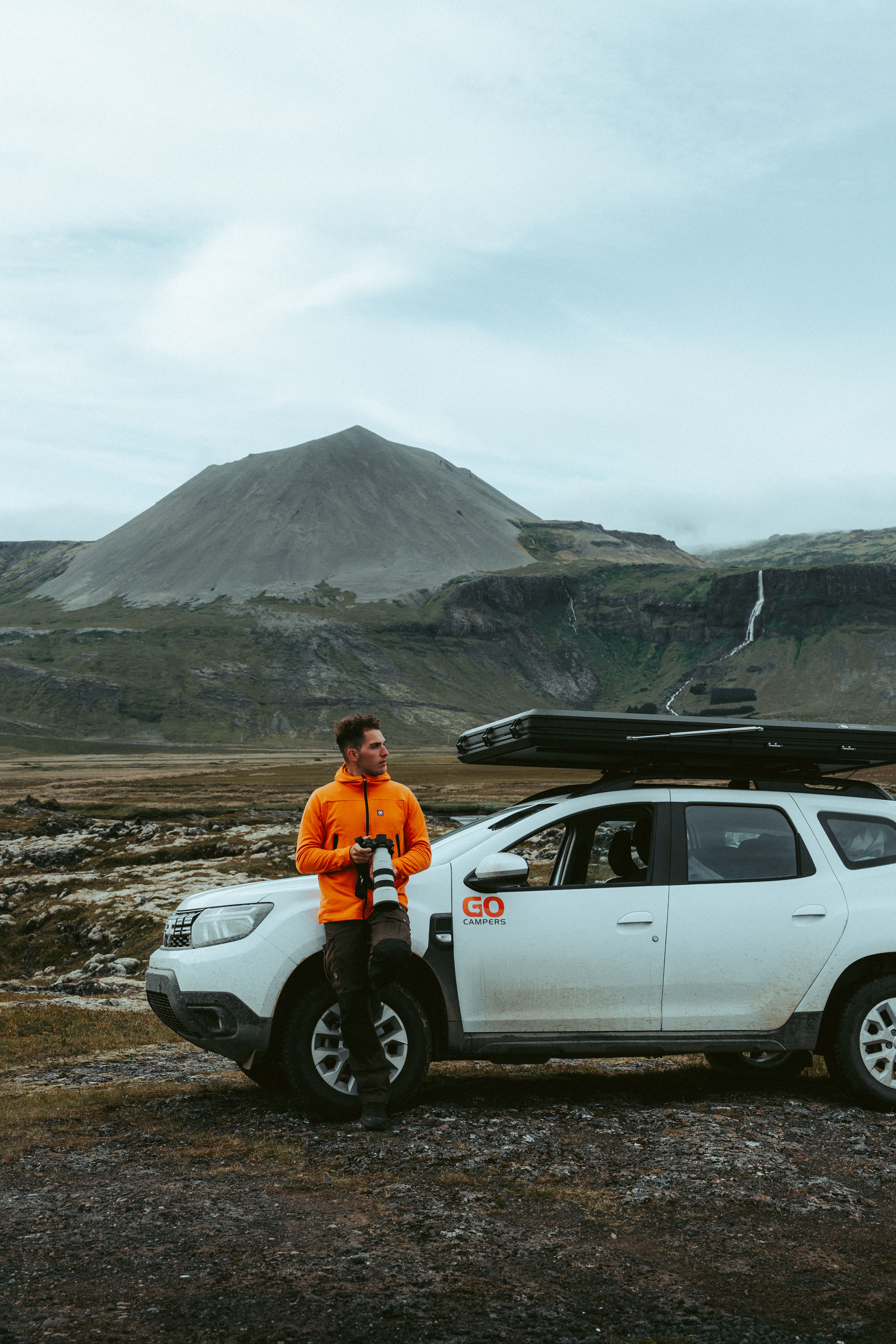 A 4x4 camper that sleeps 2 people with rooftop tent folded down, campervan rental Iceland