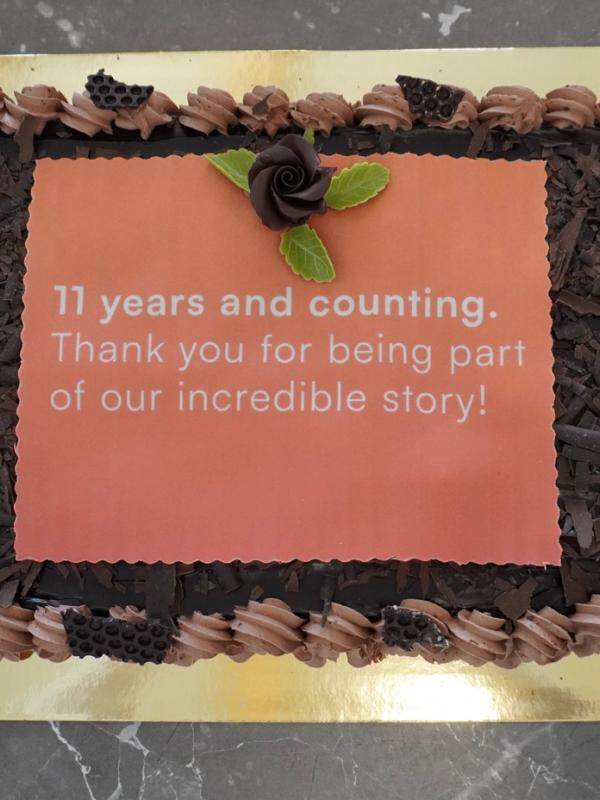 a chocolate cake with a message on it that says 11 years and counting
