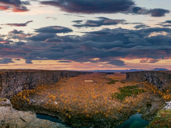 Canyon in Iceland with autumn colors on its trees
