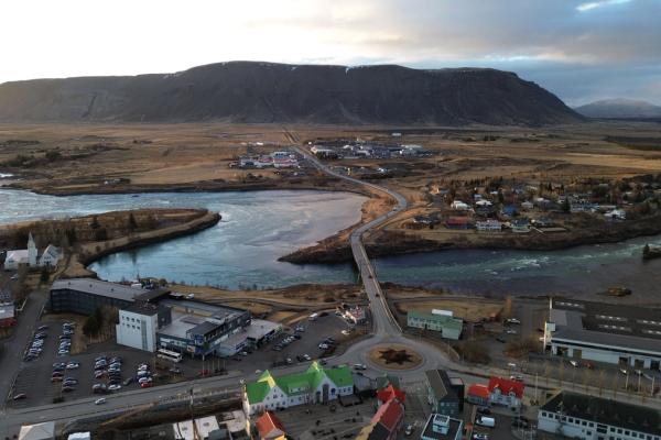 Aerial view of a small town next to a river