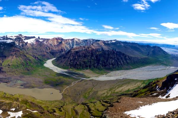 panoramic view of a valley from a peak