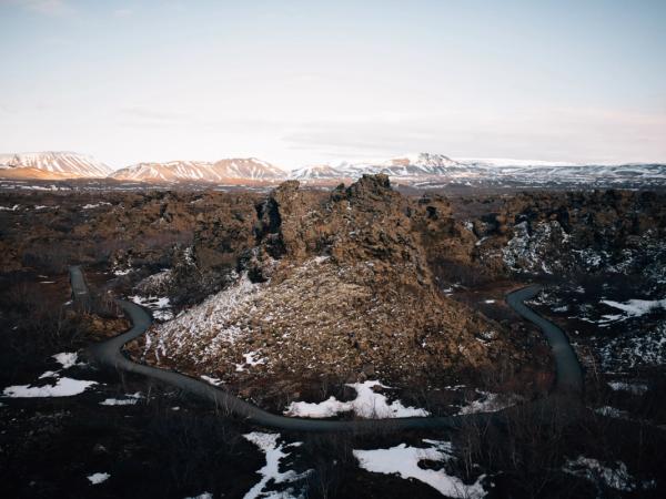 a lava field with a bit of snow