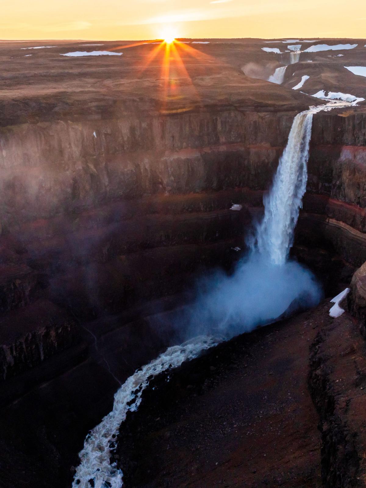Hengifoss waterfall at sunrise