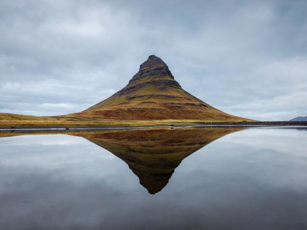 mountain reflected on a calm body of water