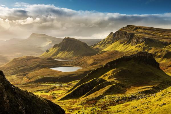 there is a lake in the middle of the mountains, Icelandic Highlands