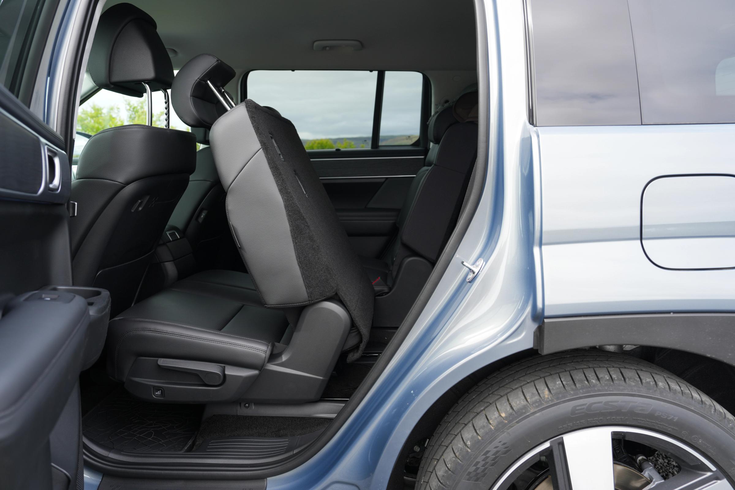 Hyundai Santa Fe second row seat folded forward through the open rear door for third row access