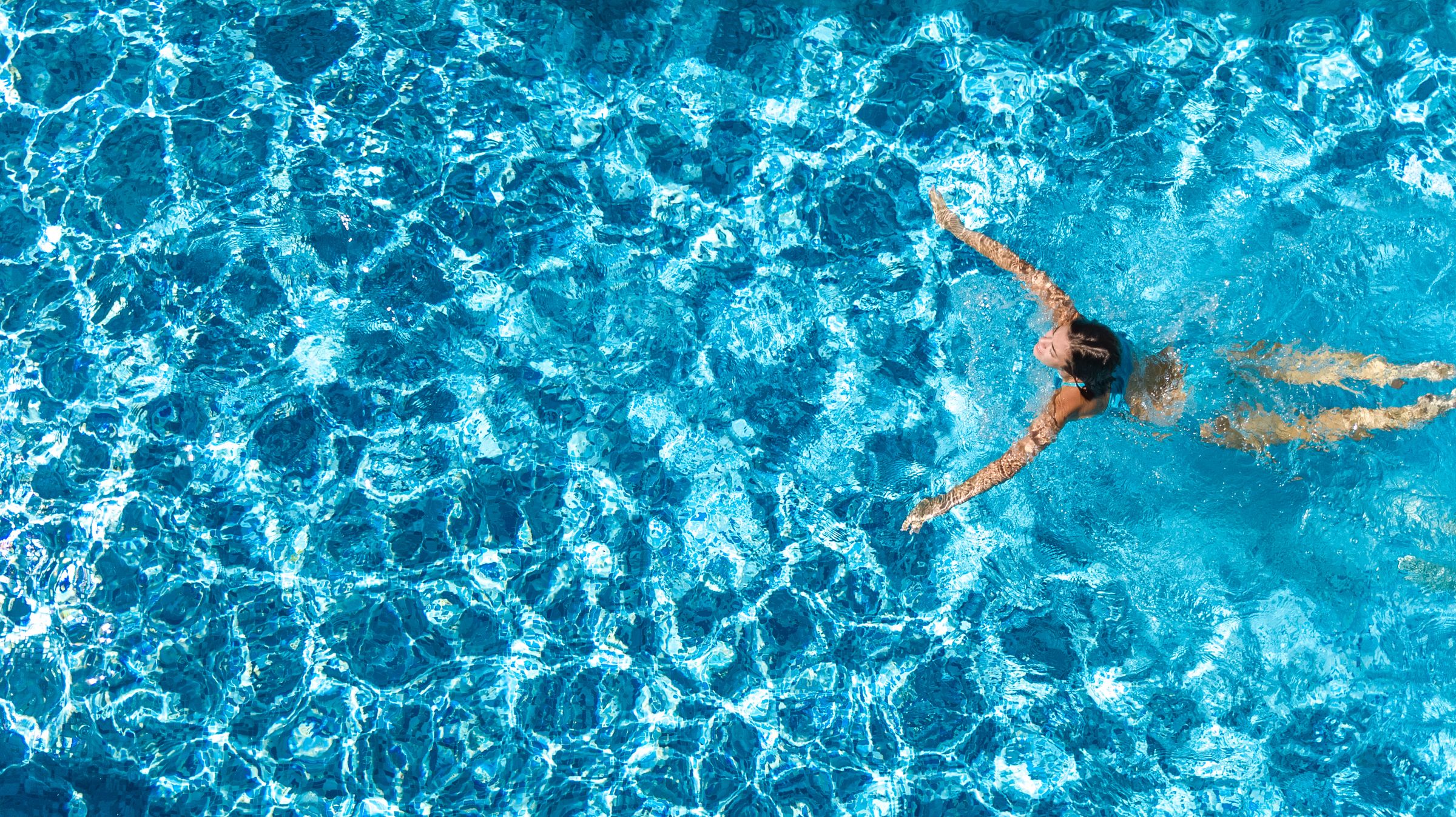 women swimming in a pool